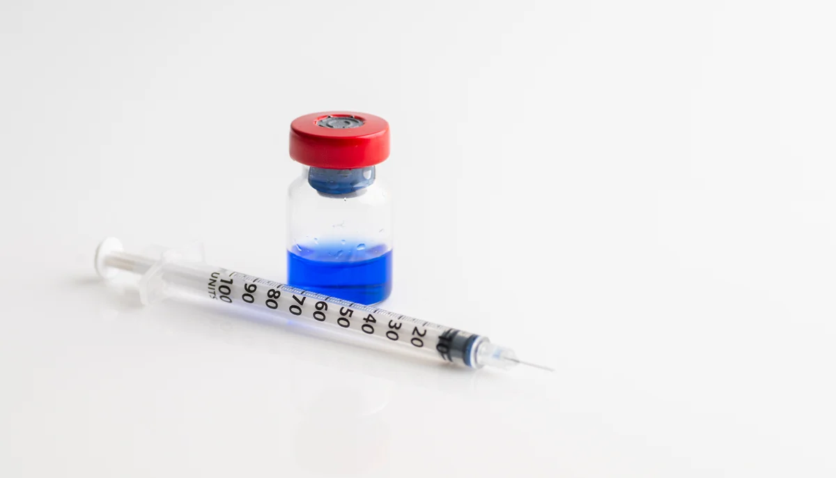A peptide vial and syringe representing physician-guided peptide therapy at Pure Body Health in South Tempe, AZ
